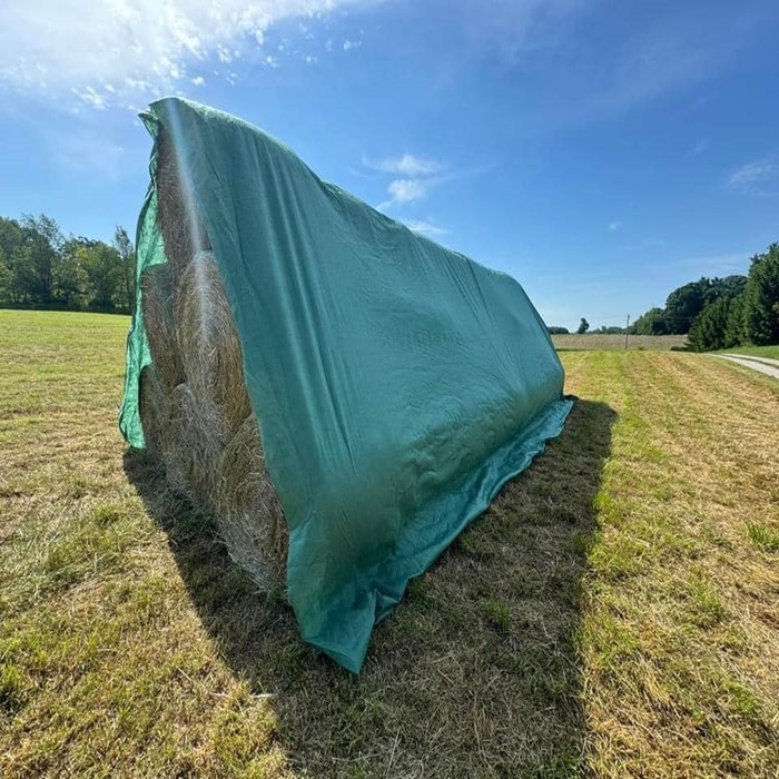 Moisture-resistant hay tarps
